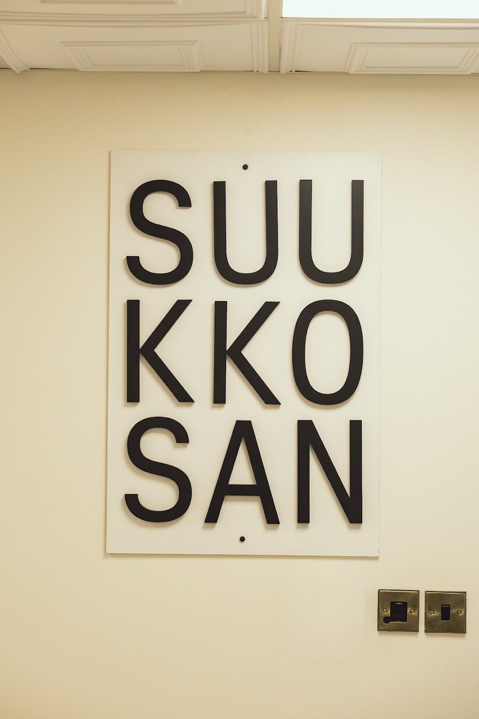 The Suukkosan sign on the salon wall